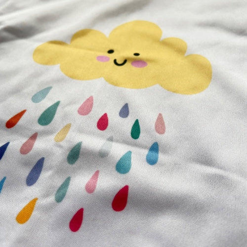 Close up of a wet bag with a cloud and colourful rain