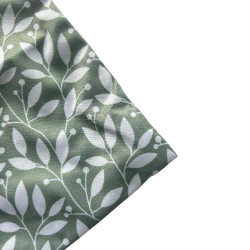 Close up of a greenery themed mini wet bag