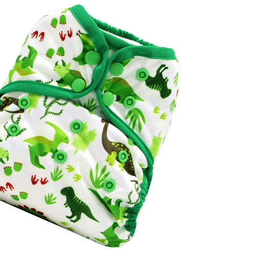 Tilted view of a reusable nappy cover with green dinosaurs