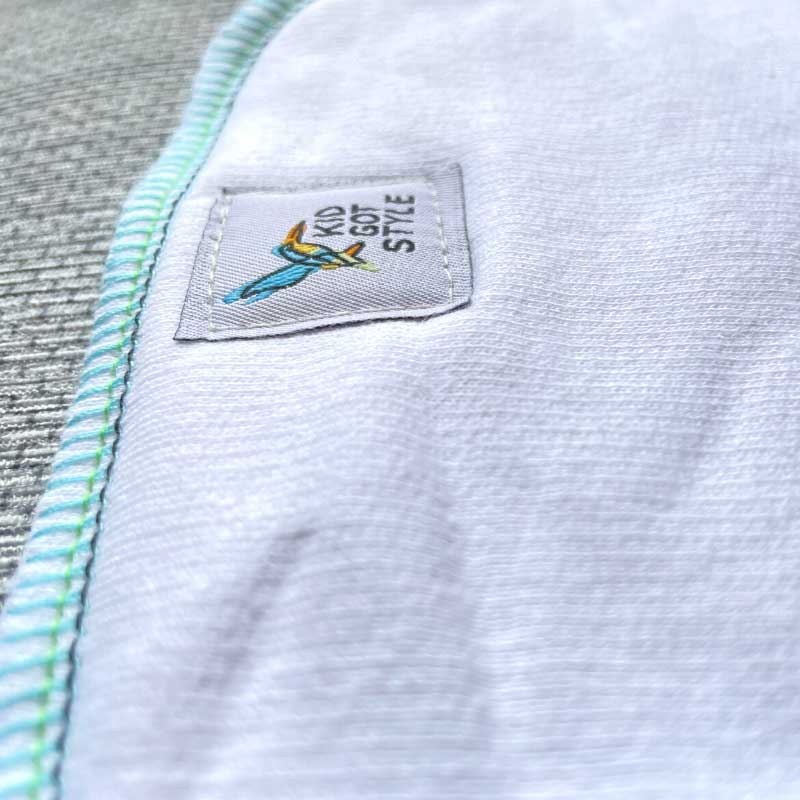 Close-up of fat fleece cotton insert with Kid Got Style label