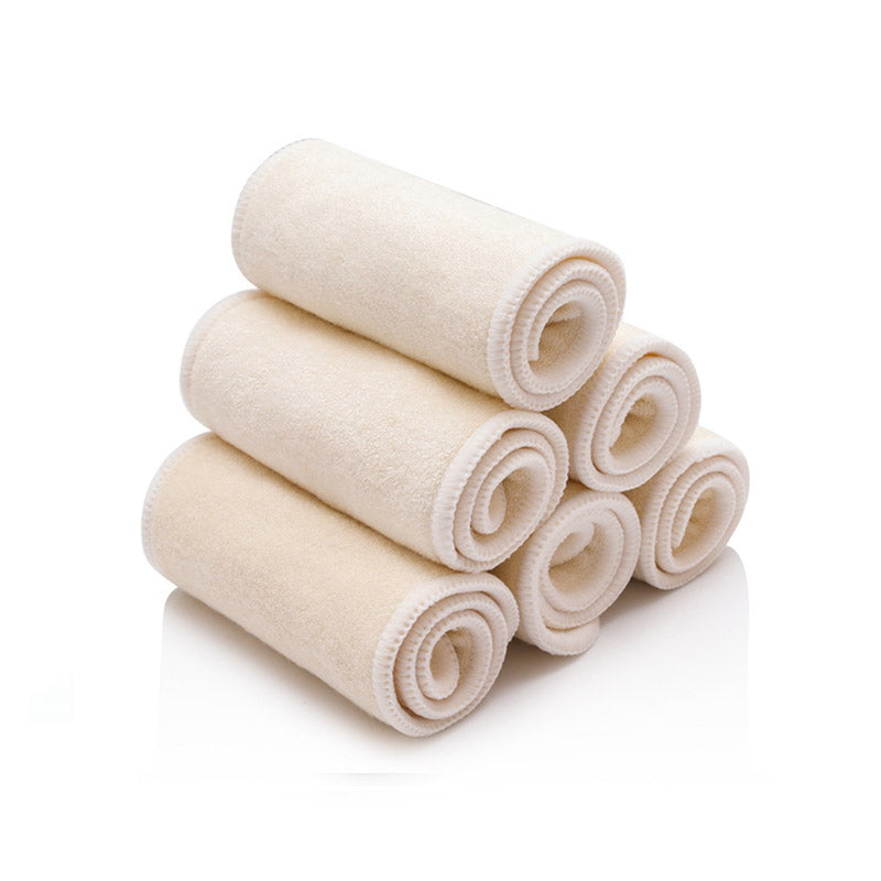 Rolled and stacked hemp inserts for reusable nappies
